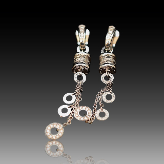 Boucles d'oreilles Bulgari "B zero 1 " en Or gris 18 Cts  avec diamants vers 2014 .