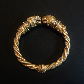  Bracelet "Têtes de Lions" signé LALAOUNIS or jaune 18 k , rubis et diamants