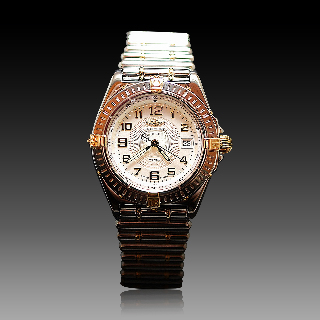 Montre Breitling "Wings" de dame en Or et Acier Quartz . Réf : B67050.