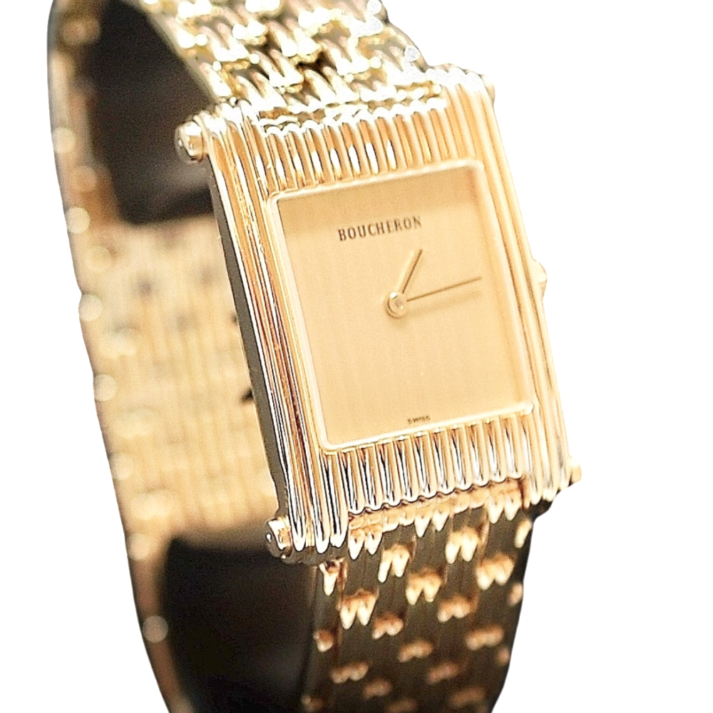 Montre Boucheron "Reflet"  grand modèle à quartz en or jaune 18k .