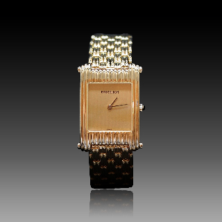 Montre Boucheron "Reflet"  grand modèle à quartz en or jaune 18k .