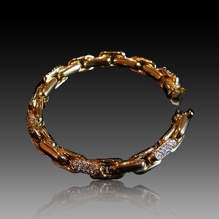 Bracelet gourmette or jaune 18k massif avec Diamants Brillants.