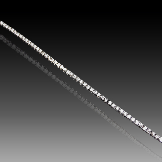 Bracelet ligne en or gris 18k avec 5.80 Cts de Diamants brillants blancs.