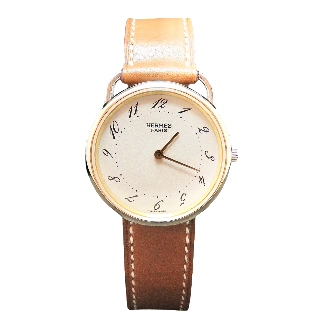 Montre Hermes "Arceau" Or et Acier . Quartz. 33 mm.