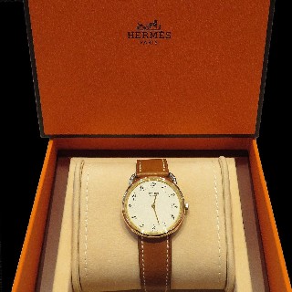 Montre Hermes "Arceau" Or et Acier . Quartz. 33 mm.