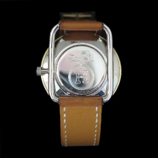 Montre Hermes "Arceau" Or et Acier . Quartz. 33 mm.