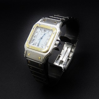 Montre Cartier Homme "Santos" Rectangulaire en Or et Acier Automatique Vers 1990.