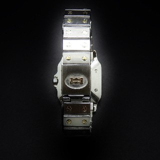 Montre Cartier Homme "Santos" Rectangulaire en Or et Acier Automatique Vers 1990.