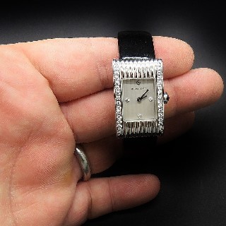 Montre Boucheron "Reflet" de Dame petit modèle acier et Diamants .