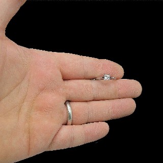 Solitaire Tiffany Platine, Diamant princesse 0,40 Ct H-VVS1 Vers 2005. Taille 47.