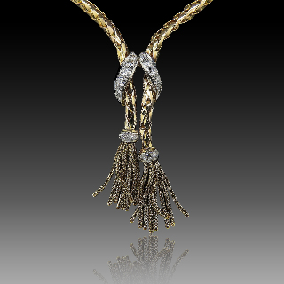 Collier pendentif en or 18 Cts et platine vers 1950 avec diamants . Collier pendentif en or 18 Cts et platine vers 1950 avec diamants .
