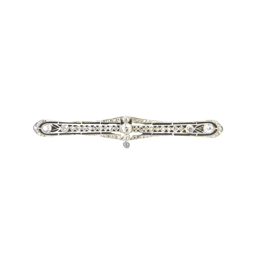 Broche vers 1890 en or 18k et argent avec diamants taille ancienne.