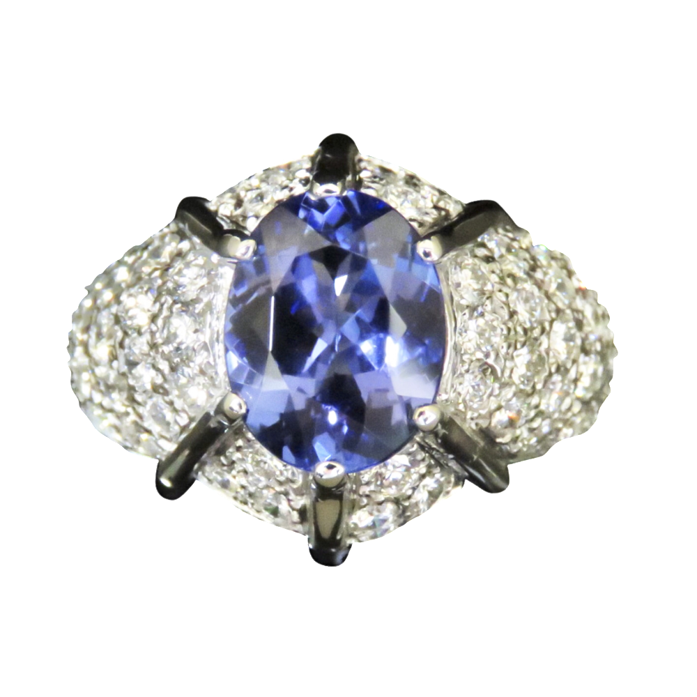 Bague en or gris 18k avec Tanzanite et diamants brillants . Bague en or gris 18k avec Tanzanite et diamants brillants .