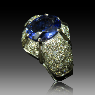 Bague en or gris 18k avec Tanzanite et diamants brillants .