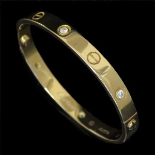 Bracelet Cartier Love 6 Diamants de 2004 Or jaune 18K . Taille 17 .