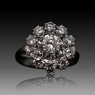 Bague entourage Or Gris 18K avec Diamants. Vers 1970 Bague entourage Or Gris 18K avec Diamants. Vers 1970
