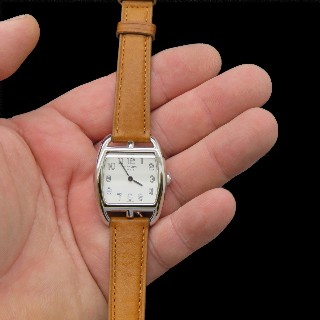 Montre Hermes Cap Cod tonneau petit modèle en Acier quartz de 2010. Boite & Papiers.