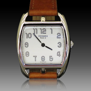 Montre Hermes Cap Cod tonneau Dame petit modèle en Acier quartz de 2010. Boite & Papiers.