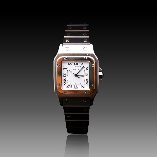 Montre Cartier Homme "Santos" Rectangulaire en Or et Acier Automatique Vers 1990.