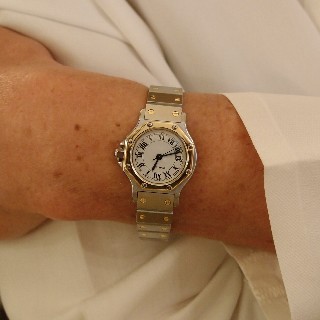 Montre Cartier dame "Santos" Octogonale en or et acier Automatique Vers 1990.