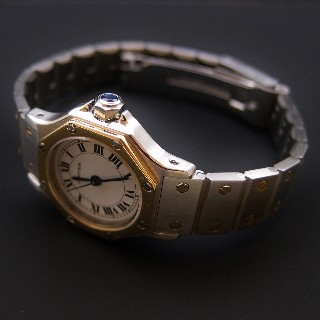 Montre Cartier dame "Santos" Octogonale en or et acier Automatique Vers 1990.