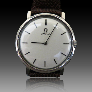  Montre Omega extraplate Acier Vers 1965. 31 mm. Mécanique.