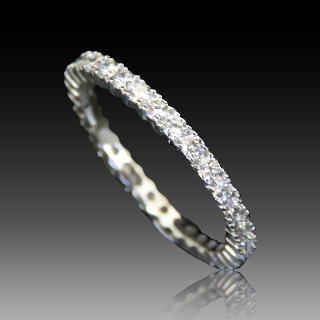 Alliance or gris 18K avec 0.76 Cts Diamants G-VS . Taille 54.