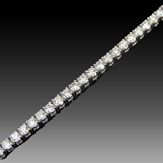 Bracelet ligne en or gris 18k avec 3.01 Cts de Diamants brillants Extrablancs.