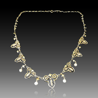 Collier Draperie Napoléon III en or jaune 18k et perles fines . Collier Draperie Napoléon III en or jaune 18k et perles fines .