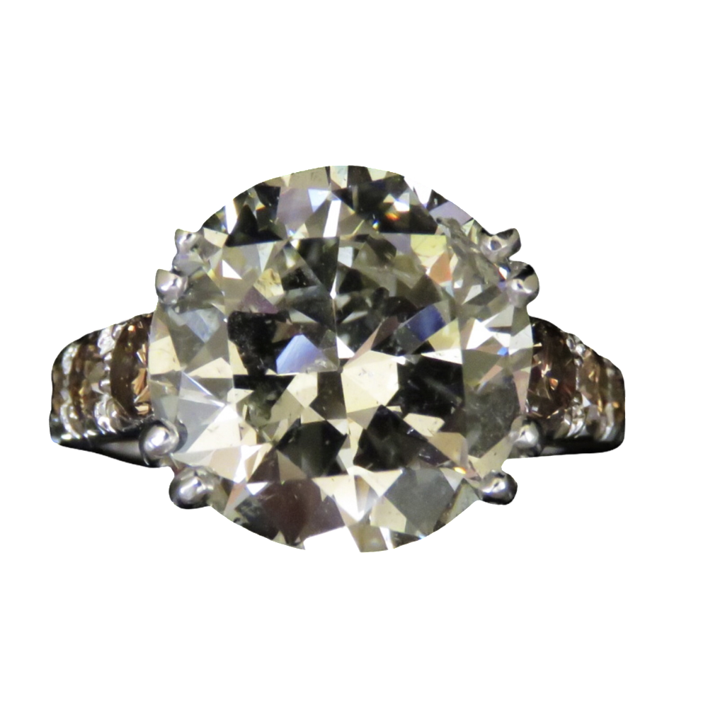 Solitaire en or gris 18k et platine avec Diamant 1/2 taille de 5,80 Cts M-P1 + 0.50 Cts. Solitaire en or gris 18k et platine avec Diamant 1/2 taille de 5,80 Cts M-P1 + 0.50 Cts.