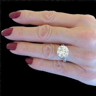 Solitaire en or gris 18k et platine avec Diamant 1/2 taille de 5,80 Cts M-P1 + 0.50 Cts.