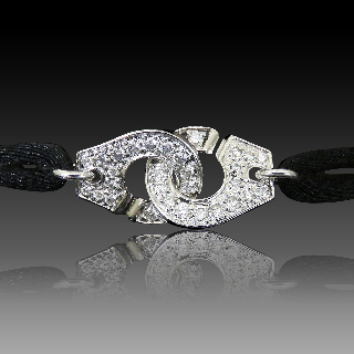 Bracelet DinhVan Menottes R12  Grand modèle Or Gris 18 k et diamants .  