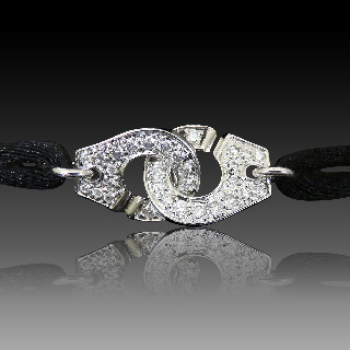 Bracelet DinhVan Menottes R12 Grand modèle Or Gris 18 k et diamants . Bracelet DinhVan Menottes R12 Grand modèle Or Gris 18 k et diamants .