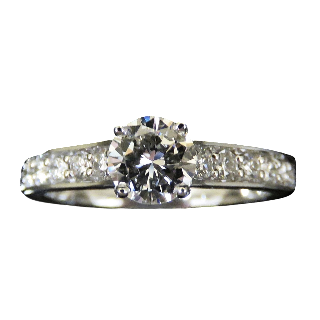 Solitaire en Or gris 18 Cts avec Diamant brillant 0.76 Cts E-VS1 + 0.38 Cts.