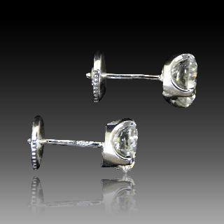 Puces d'oreilles Or gris 18k avec Diamants brillants 1.05 Cts et 1.04 Cts. F-VVS1-G-VVS2