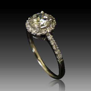 Solitaire en Or gris 18 Cts avec Diamant brillant 1.00 Cts G-VVS2 + 0.27 Cts.