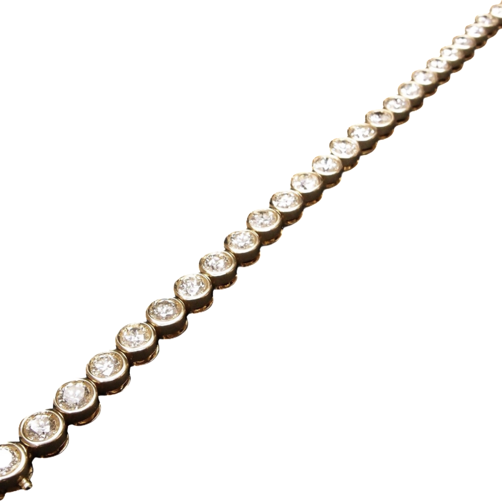 Bracelet ligne en or jaune 18 Cts avec 27 diamants H/VS  Total : 6.8 Cts