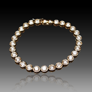 Bracelet ligne en or jaune 18 Cts avec 27 diamants H/VS  Total : 6.8 Cts