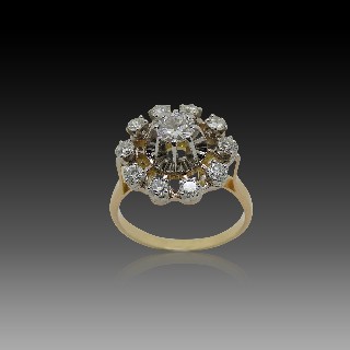 Bague entourage Or 18K et platine avec Diamants. Vers 1970