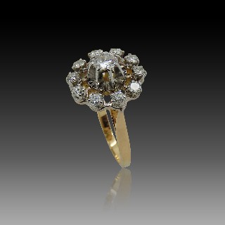 Bague entourage Or 18K et platine avec Diamants. Vers 1970