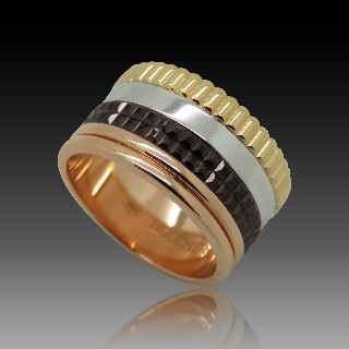 Bague Boucheron "Quatre" vers 2012 en Or rose 18k Massif et Pvd Marron . Taille 53 .