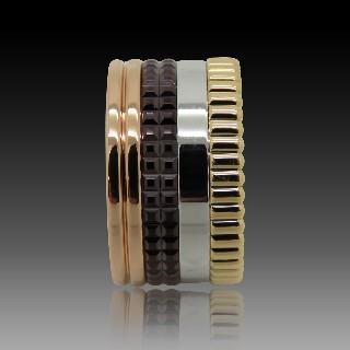 Bague Boucheron "Quatre" vers 2012 en Or rose 18k Massif et Pvd Marron . Taille 53 .