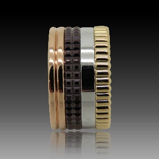 Bague Boucheron "Quatre" vers 2012 en Or rose 18k Massif et Pvd Marron . Taille 53 . Bague Boucheron "Quatre" vers 2012 en Or rose 18k Massif et Pvd Marron . Taille 53 .