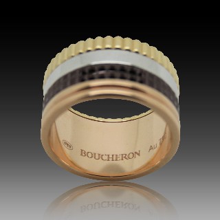 Bague Boucheron "Quatre" vers 2012 en Or rose 18k Massif et Pvd Marron . Taille 53 . Bague Boucheron "Quatre" vers 2012 en Or rose 18k Massif et Pvd Marron . Taille 53 .