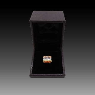 Bague Boucheron "Quatre" vers 2012 en Or rose 18k Massif et Pvd Marron . Taille 53 . Bague Boucheron "Quatre" vers 2012 en Or rose 18k Massif et Pvd Marron . Taille 53 .