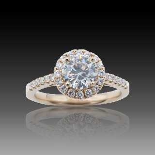 Solitaire en Or rose 18 Cts avec Diamant brillant 0.93 Cts H-VS1 + 0.28 Cts.