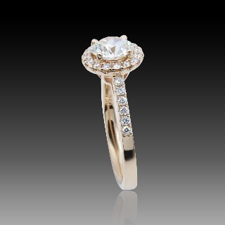 Solitaire en Or rose 18 Cts avec Diamant brillant 0.93 Cts H-VS1 + 0.28 Cts.