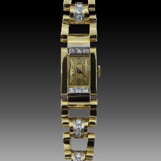 Montre Dame Tank vers 1950 en Or 18k & platine avec diamants