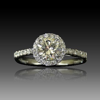 Solitaire en Or gris 18 Cts avec Diamant brillant 0.93 Cts H-VS1 + 0.27 Cts.