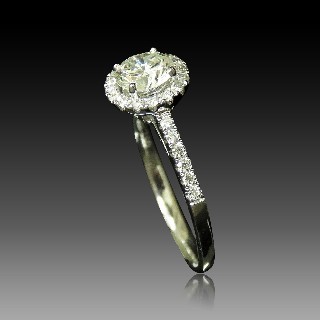 Solitaire en Or gris 18 Cts avec Diamant brillant 0.93 Cts H-VS1 + 0.27 Cts.